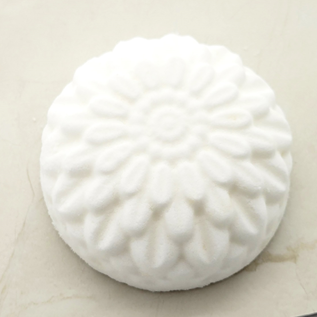 Relaxing essential oil shower steamers shaped like flowers